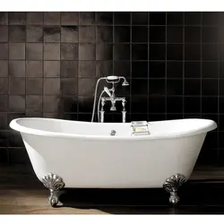 Cast iron bathtub with legs photo