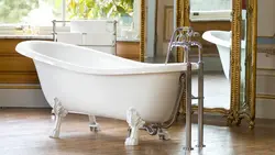 Cast iron bathtub with legs photo