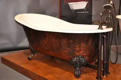 Чыгунная ванна з ножкамі фота