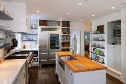 Open refrigerator in the kitchen photo