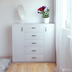 Tall chest of drawers in the bedroom photo