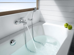 Photo Of A Bathtub With A Tap In The Middle