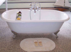 Photo Of A Bathtub With A Tap In The Middle