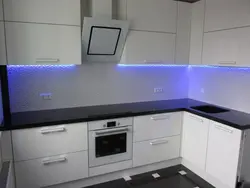 White kitchen with lighting photo