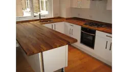 Kitchen with oak countertop photo