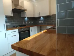 Kitchen with oak countertop photo