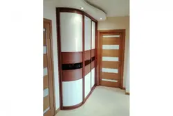 Semicircular wardrobe in the hallway photo