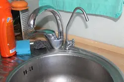 Faucet filter in the kitchen photo