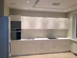 Photo Of A Beige Kitchen With A Hood