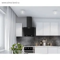 Photo Of A Beige Kitchen With A Hood