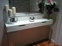 Hanging console in the bedroom photo
