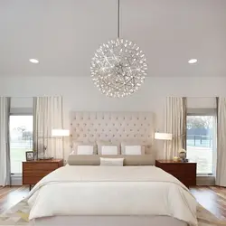 White chandelier in the bedroom photo