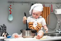 Little Girl In The Kitchen Photo