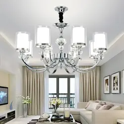 White chandelier in the living room interior photo