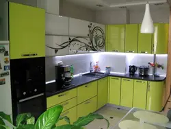Green Kitchen With Black Countertop Photo