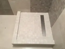 Podium in the bathroom for shower photo