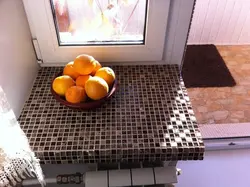 Window sill made of tiles in the kitchen photo