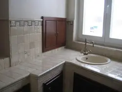 Window sill made of tiles in the kitchen photo