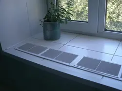 Window sill made of tiles in the kitchen photo