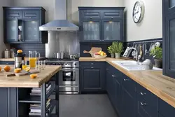 Gray kitchen with blue chairs photo