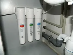 Water filter in the kitchen photo