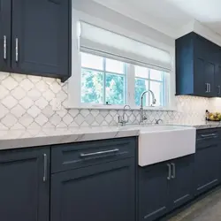 Gray kitchen with black apron photo