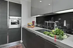 Gray Kitchen With Black Apron Photo