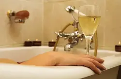 In The Bath With A Glass Of Wine Photo