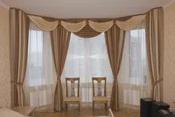 Curtains on the arch in the living room photo