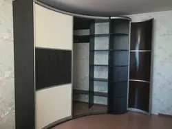 Радиусный угловой шкаф в гостиную фото