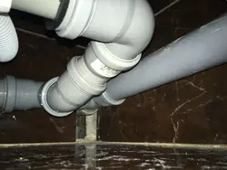 How to connect a bathtub to the sewer photo
