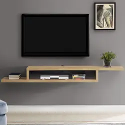 Qonaq otağındakı televizor konsolu fotoşəkili