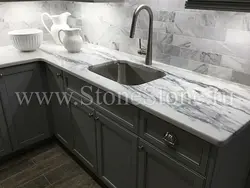 Gray kitchen with marble countertop photo