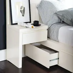 Table with cabinet in the bedroom photo