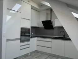 Kitchen up to the ceiling without handles photo