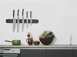 Magnet for knives photo in the kitchen