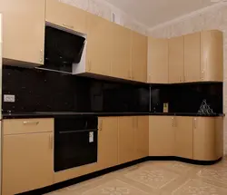 Black Appliances In A Beige Kitchen Photo