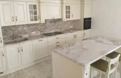 Beige marble kitchen countertop photo