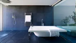 Photo against the background of tiles in the bathroom