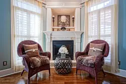 Armchairs by the window in the living room photo