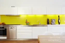 White kitchen with yellow apron photo