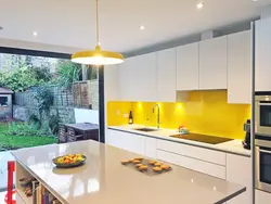 White kitchen with yellow apron photo