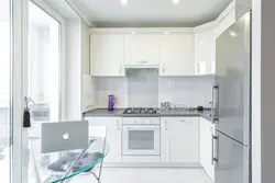 Corner Kitchen Refrigerator By The Window Photo