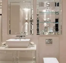 Photo of a mirror above the bathroom sink