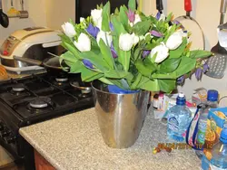 Flowers in the kitchen in a vase photo