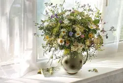 Flowers in the kitchen in a vase photo