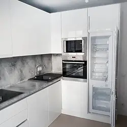 Photo Of White Kitchen With Gray Appliances