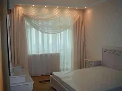 Tulle with curtains in the bedroom photo