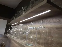 Photo of illuminated shelves in the kitchen