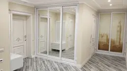 White Mirrored Wardrobe In The Hallway Photo
